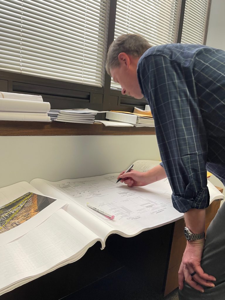 Engineer Matt Rocksvold reviews plans. 
